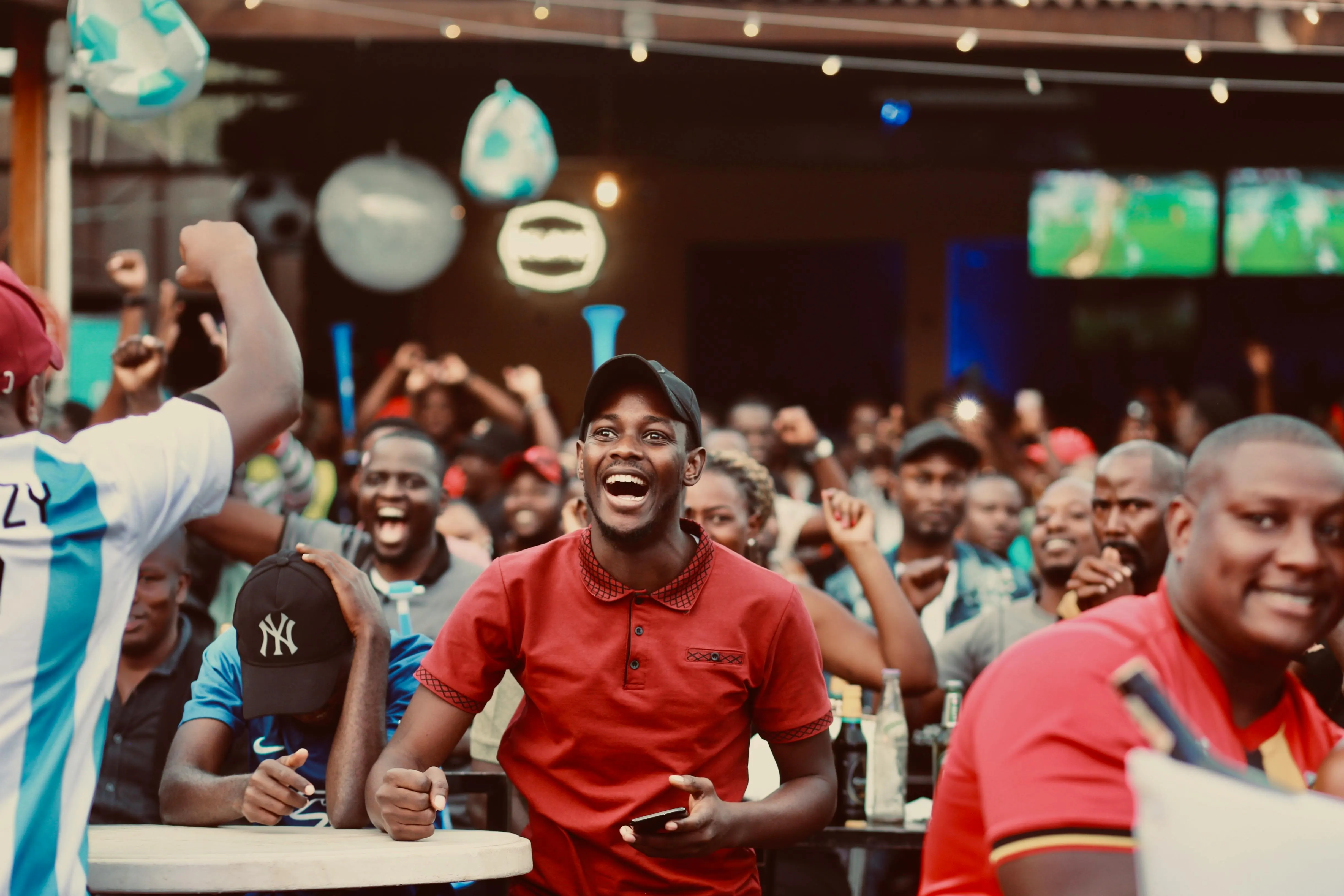 Fans watching soccer together at a sports bar